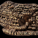 Illustration for article titled Why is this 4,500 year-old purse covered with a hundred dog teeth?